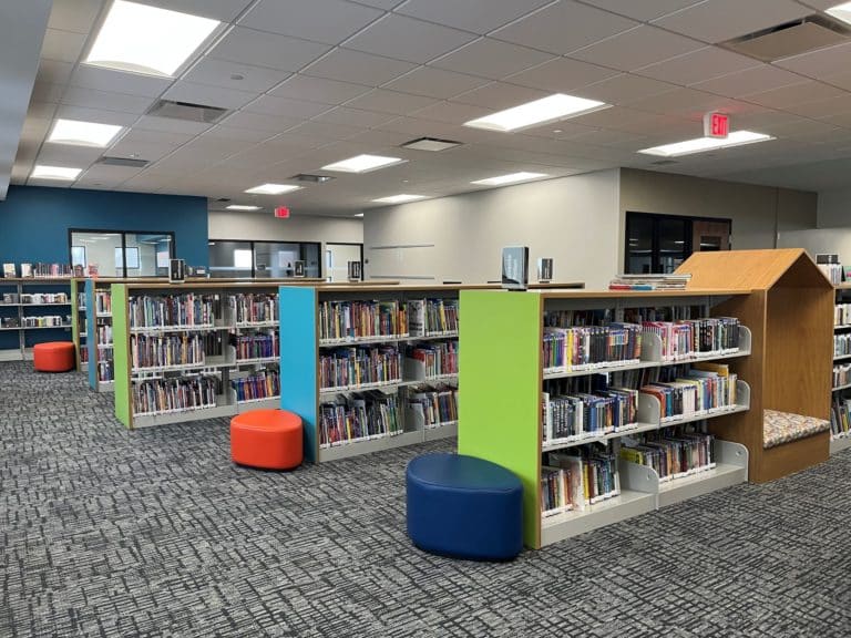 children's area shelving with colorful end panels