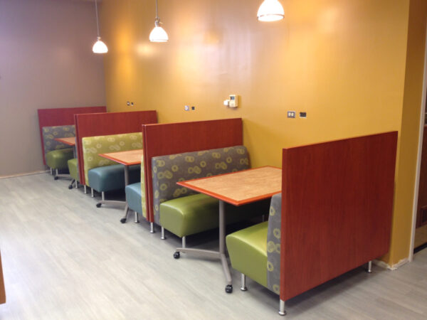 Soft seating booths with mobile rectangular tables