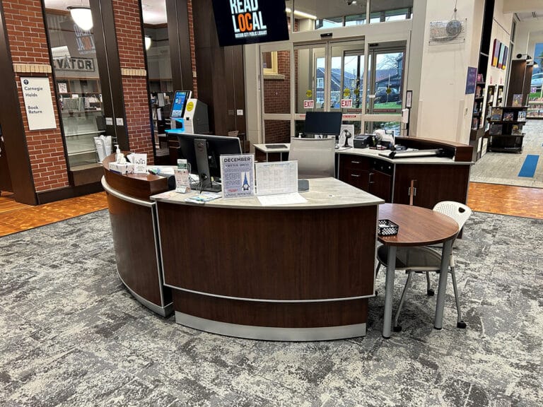 Oregon City Circulation Service and Staff Desk with swing gate and two height adjustable sections.