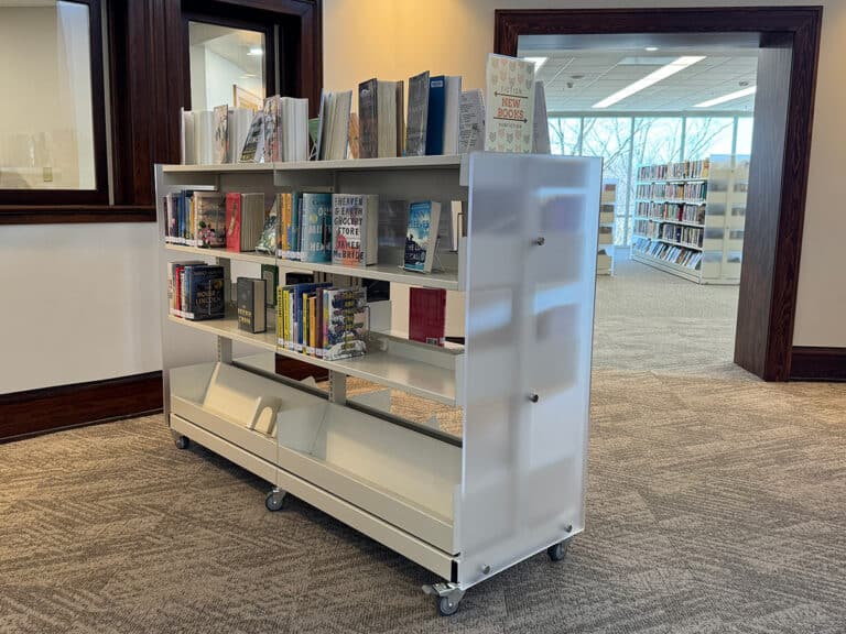 DF 48"H Mobile Shelving Unit with Frosted Acrylic End Panels from Mount Carroll Public Library