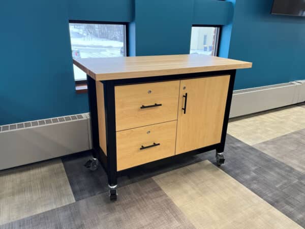 Maker demonstration table with cabinet and drawers