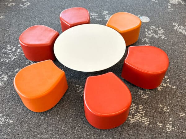 Kids sized table and petal shaped soft seating