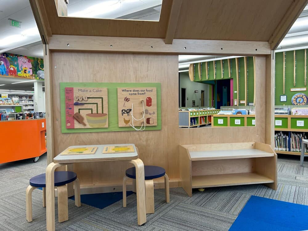 Ames PL Play Structure interior with table and bench