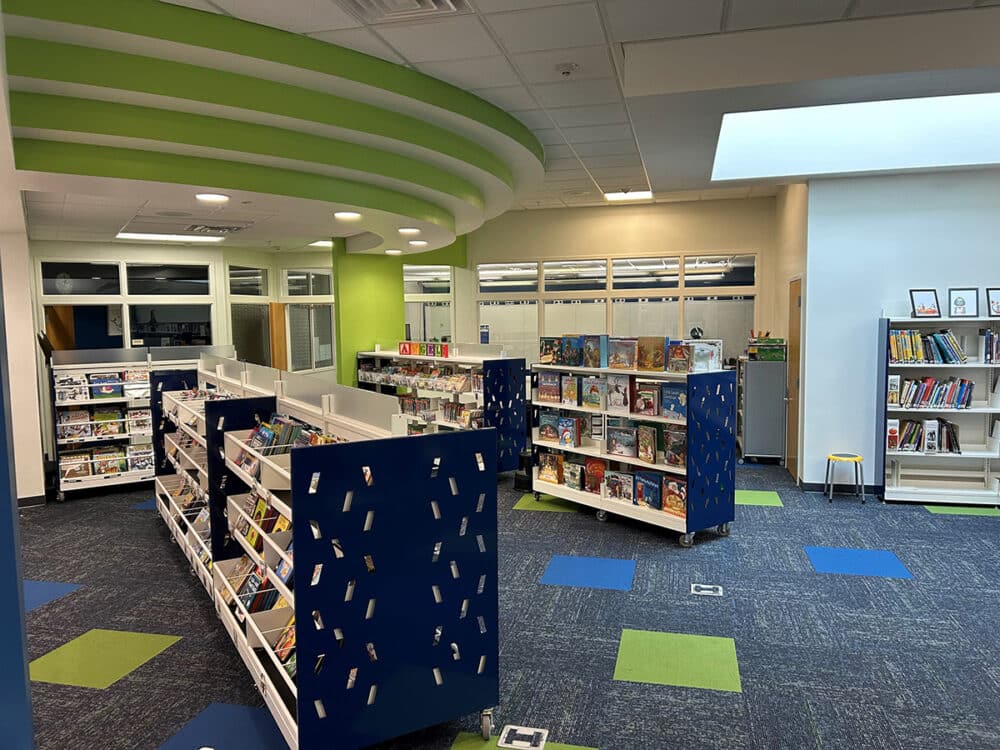 St. Patrick School Mobile Display Shelving with Royal Blue Perforated End Panels