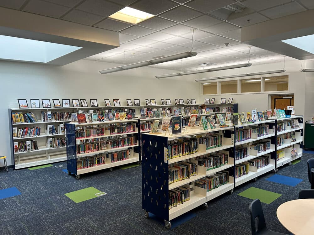 St. Patrick School Mobile Display Shelving with Royal Blue Perforated End Panels